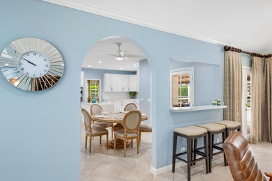 Discover comfortable luxury in this expansive single-story on Atlantis Golf Club in Florida - for sale on GolfHomes.com, golf home, golf lot