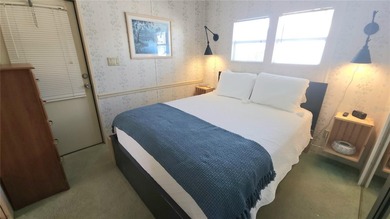 CHEERFUL HOME IN ACTIVE 55+ COMMUNITY! This one bed, 1 1/2 bath on River Run Golf Links in Florida - for sale on GolfHomes.com, golf home, golf lot