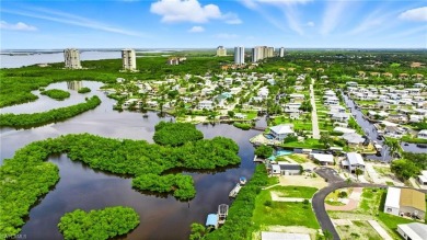 Build your dream home on this one-of-a-kind waterfront lot in on Pelicans Nest Golf Club in Florida - for sale on GolfHomes.com, golf home, golf lot