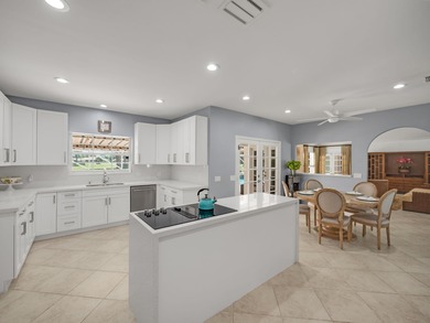 Discover comfortable luxury in this expansive single-story on Atlantis Golf Club in Florida - for sale on GolfHomes.com, golf home, golf lot