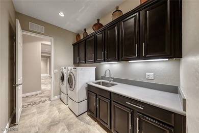 Located in the desirable guard gated Southern Highlands Golf on Southern Highlands Golf Club in Nevada - for sale on GolfHomes.com, golf home, golf lot