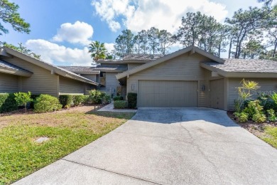 Nestled under the mature trees, in a very quiet subdivision is on Saddlebrook Golf and Country Club in Florida - for sale on GolfHomes.com, golf home, golf lot