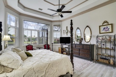 This beautiful 3-bedroom, plus office, 2.5-bathroom lakefront on Banyan Golf Club in Florida - for sale on GolfHomes.com, golf home, golf lot