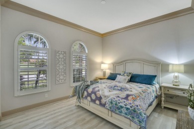 This beautiful 3-bedroom, plus office, 2.5-bathroom lakefront on Banyan Golf Club in Florida - for sale on GolfHomes.com, golf home, golf lot