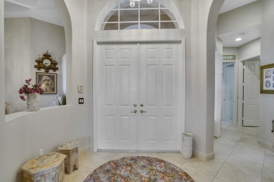 This beautiful 3-bedroom, plus office, 2.5-bathroom lakefront on Banyan Golf Club in Florida - for sale on GolfHomes.com, golf home, golf lot