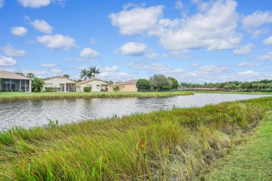 This beautiful 3-bedroom, plus office, 2.5-bathroom lakefront on Banyan Golf Club in Florida - for sale on GolfHomes.com, golf home, golf lot