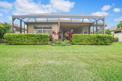 This beautiful 3-bedroom, plus office, 2.5-bathroom lakefront on Banyan Golf Club in Florida - for sale on GolfHomes.com, golf home, golf lot