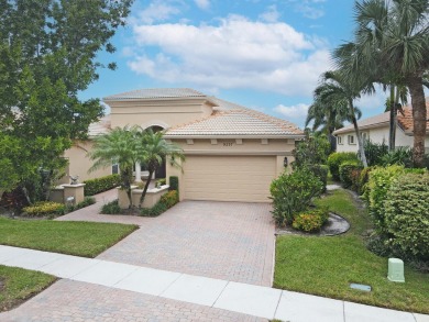 This beautiful 3-bedroom, plus office, 2.5-bathroom lakefront on Banyan Golf Club in Florida - for sale on GolfHomes.com, golf home, golf lot