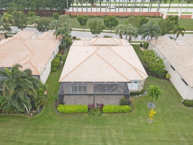 This beautiful 3-bedroom, plus office, 2.5-bathroom lakefront on Banyan Golf Club in Florida - for sale on GolfHomes.com, golf home, golf lot