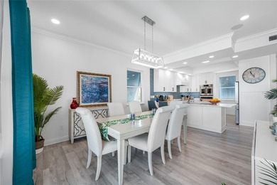 Welcome to this exceptional elvated Key West style 4-bedroom on Pasadena Yacht and Country Club in Florida - for sale on GolfHomes.com, golf home, golf lot