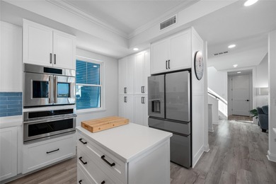 Welcome to this exceptional elvated Key West style 4-bedroom on Pasadena Yacht and Country Club in Florida - for sale on GolfHomes.com, golf home, golf lot