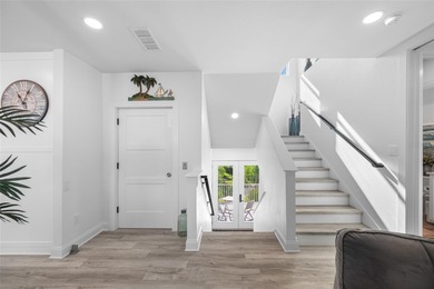 Welcome to this exceptional elvated Key West style 4-bedroom on Pasadena Yacht and Country Club in Florida - for sale on GolfHomes.com, golf home, golf lot