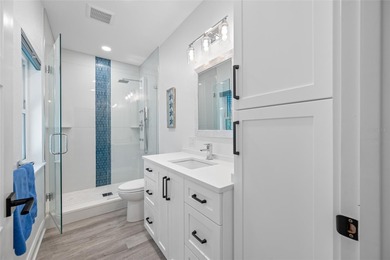 Welcome to this exceptional elvated Key West style 4-bedroom on Pasadena Yacht and Country Club in Florida - for sale on GolfHomes.com, golf home, golf lot