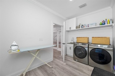 Welcome to this exceptional elvated Key West style 4-bedroom on Pasadena Yacht and Country Club in Florida - for sale on GolfHomes.com, golf home, golf lot