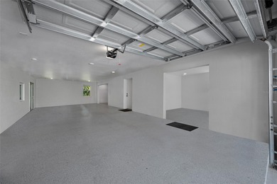 Welcome to this exceptional elvated Key West style 4-bedroom on Pasadena Yacht and Country Club in Florida - for sale on GolfHomes.com, golf home, golf lot