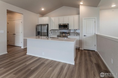 Lock-and-leave living at its best! Move-in ready and designed on Raindance National Golf Course in Colorado - for sale on GolfHomes.com, golf home, golf lot