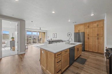 Perched on the second floor and impeccably maintained, this on Sunbrook Golf Course in Utah - for sale on GolfHomes.com, golf home, golf lot