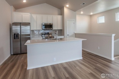 Lock-and-leave living at its best! Move-in ready and designed on Raindance National Golf Course in Colorado - for sale on GolfHomes.com, golf home, golf lot