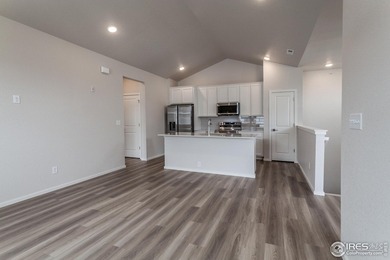 Lock-and-leave living at its best! Move-in ready and designed on Raindance National Golf Course in Colorado - for sale on GolfHomes.com, golf home, golf lot