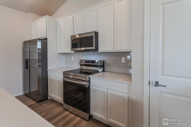 Lock-and-leave living at its best! Move-in ready and designed on Raindance National Golf Course in Colorado - for sale on GolfHomes.com, golf home, golf lot