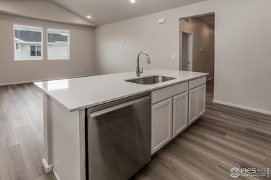 Lock-and-leave living at its best! Move-in ready and designed on Raindance National Golf Course in Colorado - for sale on GolfHomes.com, golf home, golf lot