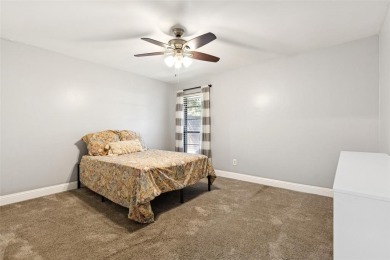 Charming and thoughtfully updated 4-bedroom, 2-bath home in the on Trophy Club of Dallas in Texas - for sale on GolfHomes.com, golf home, golf lot