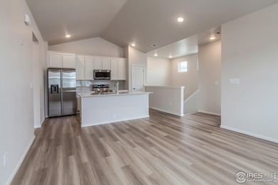 Lock-and-leave living at its best! Move-in ready and designed on Raindance National Golf Course in Colorado - for sale on GolfHomes.com, golf home, golf lot