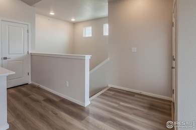 Lock-and-leave living at its best! Move-in ready and designed on Raindance National Golf Course in Colorado - for sale on GolfHomes.com, golf home, golf lot