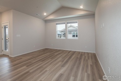 Lock-and-leave living at its best! Move-in ready and designed on Raindance National Golf Course in Colorado - for sale on GolfHomes.com, golf home, golf lot