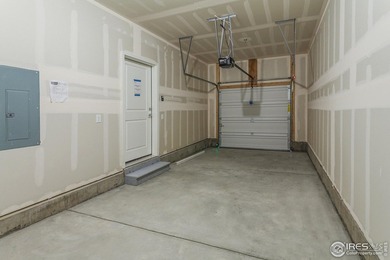 Lock-and-leave living at its best! Move-in ready and designed on Raindance National Golf Course in Colorado - for sale on GolfHomes.com, golf home, golf lot