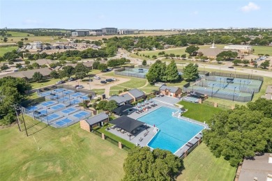 Charming and thoughtfully updated 4-bedroom, 2-bath home in the on Trophy Club of Dallas in Texas - for sale on GolfHomes.com, golf home, golf lot