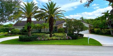 Welcome to this beautifully maintained, 4 Bed/3.5 Bath home in on Lago Mar Country Club in Florida - for sale on GolfHomes.com, golf home, golf lot