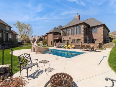 Step into luxury living with this exquisite RANCH home with on Otter Creek Golf Course in Iowa - for sale on GolfHomes.com, golf home, golf lot