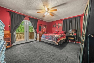 Nestled in a peaceful, wooded setting of Diamondhead Golf & on Diamondhead Golf and Country Club in Arkansas - for sale on GolfHomes.com, golf home, golf lot