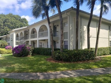 LOVELY 2ND STORY, CORNER 2BR/2BTH CONDO IN THE PEACEFUL BAHAMA on Wynmoor Golf Course in Florida - for sale on GolfHomes.com, golf home, golf lot