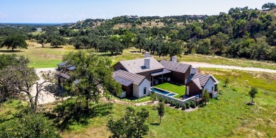 Nestled on a sprawling 2.01-acre lot, this luxurious 4-bedroom on Boot Ranch Golf Club in Texas - for sale on GolfHomes.com, golf home, golf lot