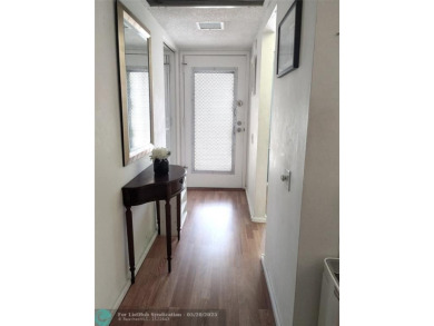 LOVELY 2ND STORY, CORNER 2BR/2BTH CONDO IN THE PEACEFUL BAHAMA on Wynmoor Golf Course in Florida - for sale on GolfHomes.com, golf home, golf lot
