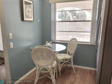 LOVELY 2ND STORY, CORNER 2BR/2BTH CONDO IN THE PEACEFUL BAHAMA on Wynmoor Golf Course in Florida - for sale on GolfHomes.com, golf home, golf lot