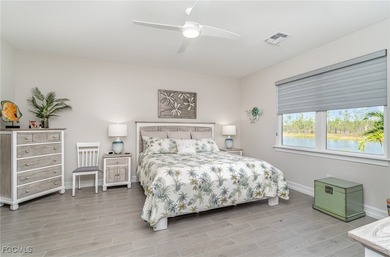 This Delray model from the Traditional Series features a tile on Herons Glen Golf and Country Club in Florida - for sale on GolfHomes.com, golf home, golf lot