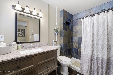 Cabin on the fairway of Pinetop Lakes Golf Course with access to on Pinetop Lakes Country Club in Arizona - for sale on GolfHomes.com, golf home, golf lot