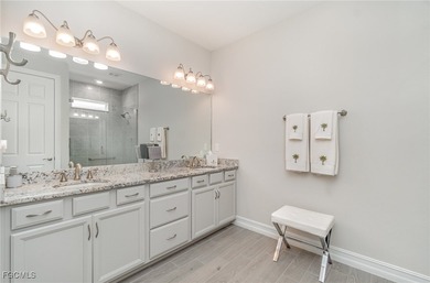 This Delray model from the Traditional Series features a tile on Herons Glen Golf and Country Club in Florida - for sale on GolfHomes.com, golf home, golf lot