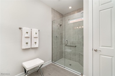 This Delray model from the Traditional Series features a tile on Herons Glen Golf and Country Club in Florida - for sale on GolfHomes.com, golf home, golf lot