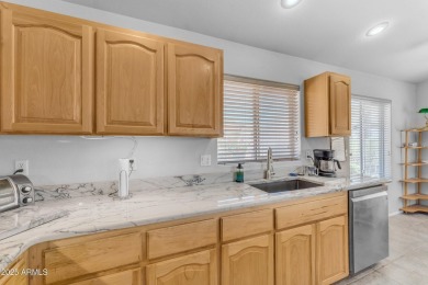 Are you looking for a cozy 2 bedroom home tucked away on a golf on Las Colinas Golf Club in Arizona - for sale on GolfHomes.com, golf home, golf lot