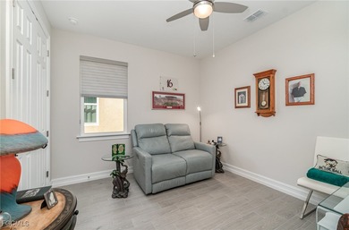 This Delray model from the Traditional Series features a tile on Herons Glen Golf and Country Club in Florida - for sale on GolfHomes.com, golf home, golf lot