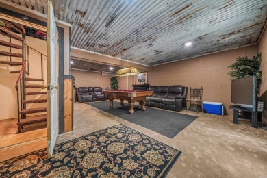Nestled in a peaceful, wooded setting of Diamondhead Golf & on Diamondhead Golf and Country Club in Arkansas - for sale on GolfHomes.com, golf home, golf lot