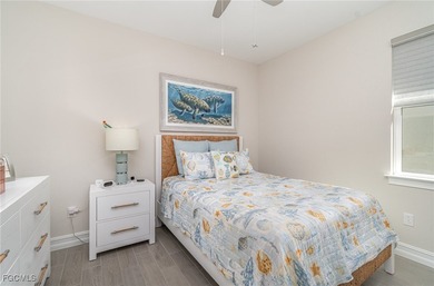 Featuring a TILE ROOF, ELEGANT STONE VENEER, IMPACT RESISTANT on Herons Glen Golf and Country Club in Florida - for sale on GolfHomes.com, golf home, golf lot