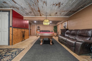 Nestled in a peaceful, wooded setting of Diamondhead Golf & on Diamondhead Golf and Country Club in Arkansas - for sale on GolfHomes.com, golf home, golf lot
