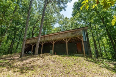 Nestled in a peaceful, wooded setting of Diamondhead Golf & on Diamondhead Golf and Country Club in Arkansas - for sale on GolfHomes.com, golf home, golf lot