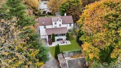 Step into the elegance of a bygone era at 15 Seymour Place in on Ridgeway Country Club in New York - for sale on GolfHomes.com, golf home, golf lot