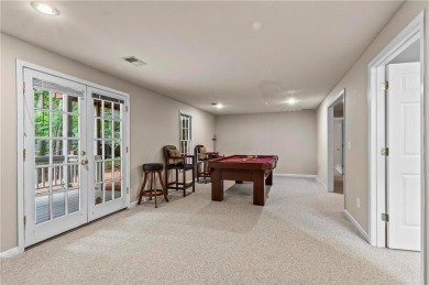 Easy Living in The Spinnakers of Windward! Downsize without on The Golf Club of Georgia in Georgia - for sale on GolfHomes.com, golf home, golf lot